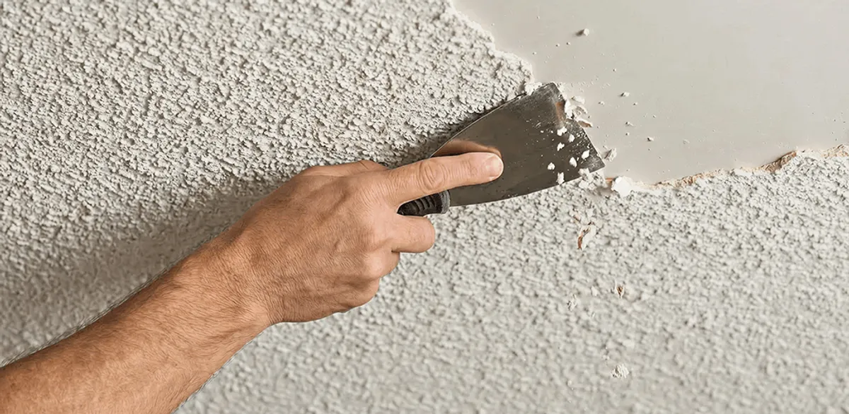 Popcorn ceiling removal scraping off textured ceiling finish in Henderson, NV